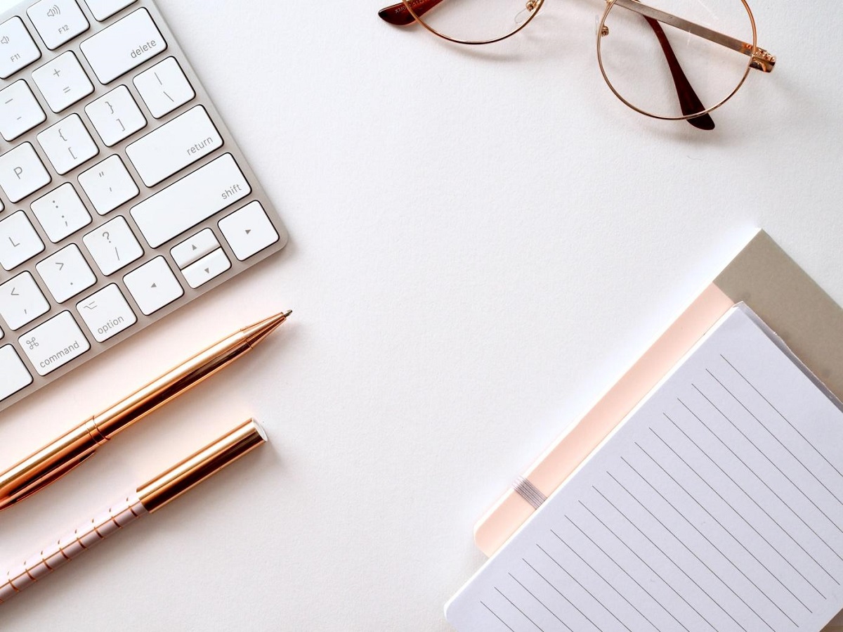 keyboard notebook and pen