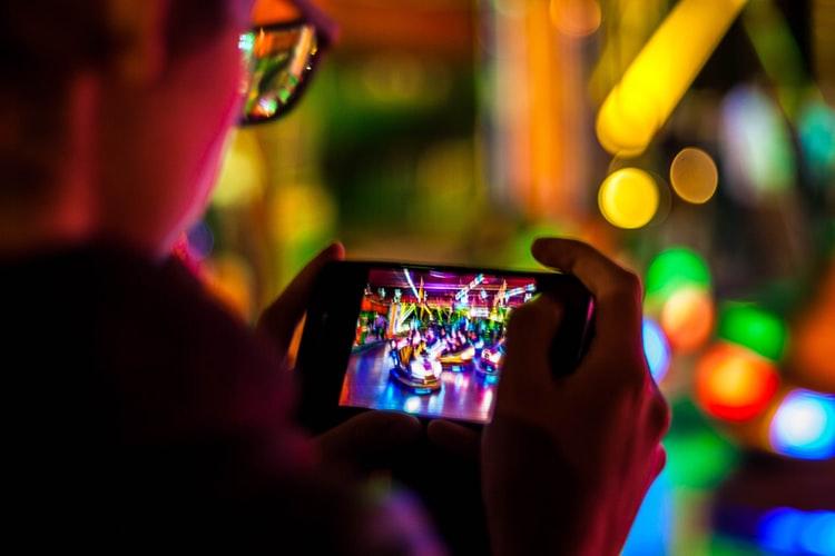 Boy watching a video on his mobile