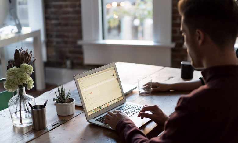 man working on laptop