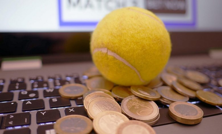 laptop and coins