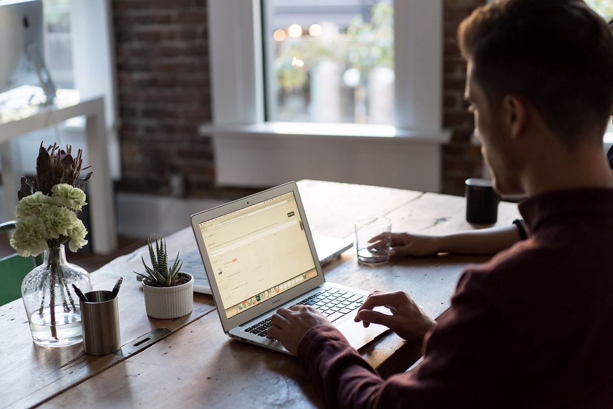 man working on laptop